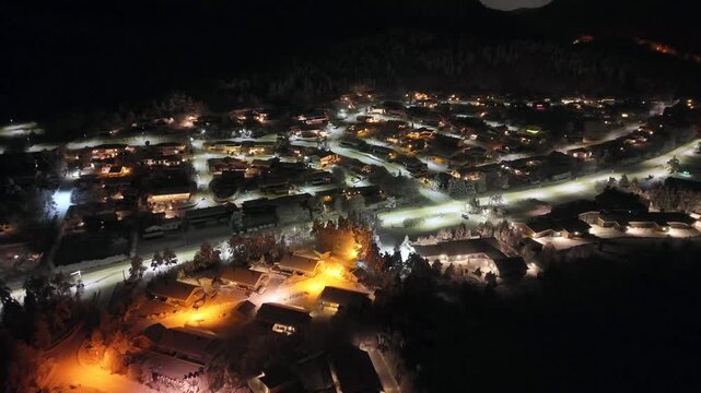 Aerial nighttime view of the suburban area of Storbakken on the island of Freioeya in Kristiansund municipality, Norway.