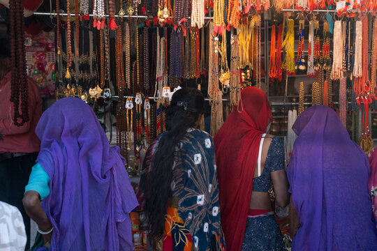 Women who are shopping in a shop in Pushkar, Rajasthan