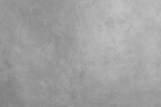 Texture astratta di parete grigia con superficie irregolare