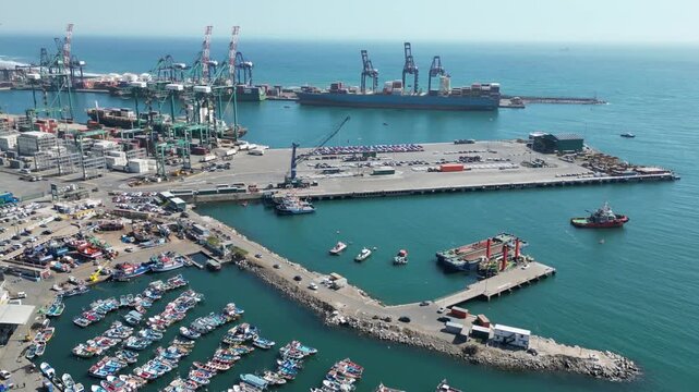 A dynamic aerial time-lapse of a bustling logistics port, where synchronized cranes load colossal ships under a dramatic, time-compressed sky.