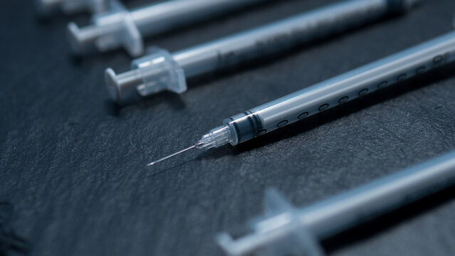 Insulin Syringes Representing Chronic Injection Therapy and Diabetes Treatment