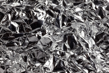 Crushed aluminum foil macro background hi density