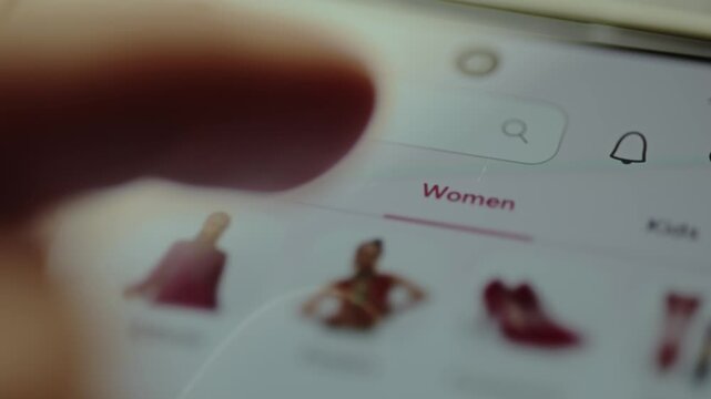 Customer selecting the Women category to filter the products from an online shop