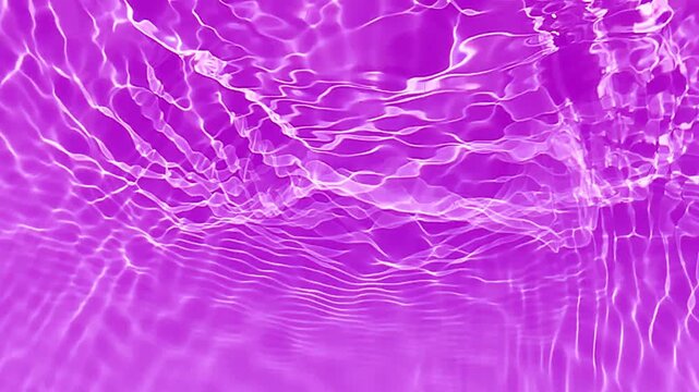 Purple water bubbles on the surface ripples. Defocus blurred transparent pink colored clear calm water surface texture with splash and bubbles. Water waves with shining pattern texture background