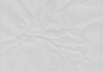 Obraz premium High resolution crumpled white paper texture with visible wrinkles and creases. Abstract vintage paper background suitable for design, templates and overlays.