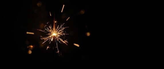 Naklejka premium Sparkling party sparkler blurred on black background for festive Christmas and New Year's Eve event, digitally generated visual