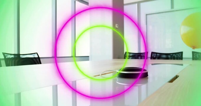 Dot appearing starting neon rings pulsing over table, balloon drifting, signaling device activation