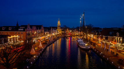 Obraz premium Aerial from christmas in the city Lemmer in Friesland the Netherlands at sunset