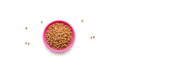 Dry cat food served in a pink bowl on white surface