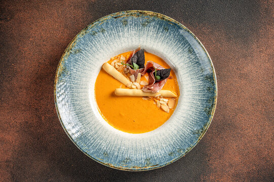 Top View Pumpkin Soup With Prosciutto