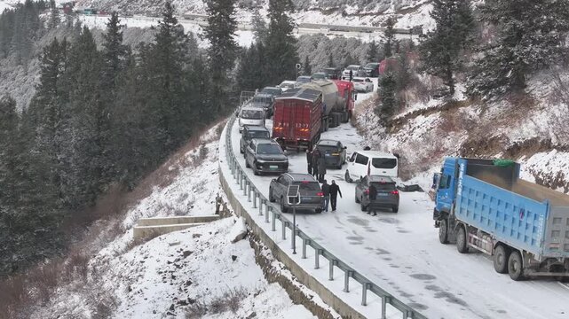 Massive traffic jam in the highlands amidst extreme ice and snow