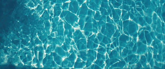 Obraz premium Water reflection of afternoon sunlight from the top view of a blue pool
