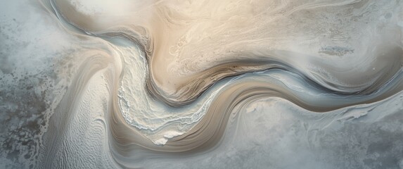 Obraz premium Aerial shot of a tranquil and picturesque river meandering across a smooth sandy landscape