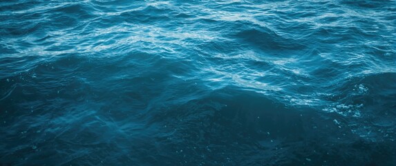 Fototapeta premium Background featuring blue ocean water surface texture