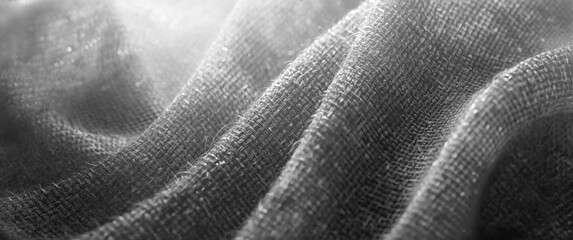 Monochrome detailed shot of woven textile surface