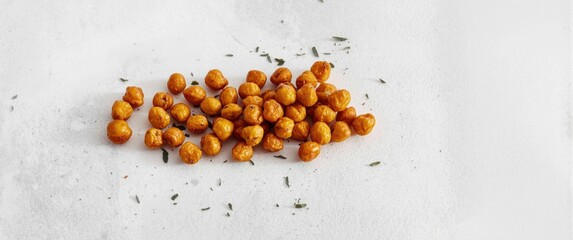 Fototapeta premium Chana (roasted chickpeas) displayed on a white background