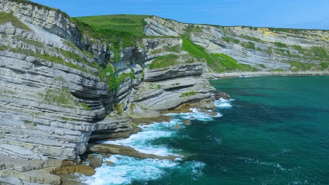 Aerial view from a drone of the coastline near Punta Ballota in the municipality of Suances. Cantabrian Sea. Cantabria. Spain. Europe
