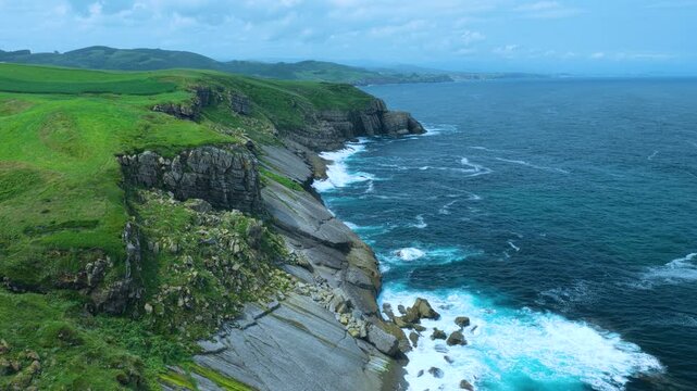 Aerial view from a drone of the coastline near Punta Ballota in the municipality of Suances. Cantabrian Sea. Cantabria. Spain. Europe