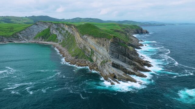 Aerial view from a drone of the coastline near Punta Ballota in the municipality of Suances. Cantabrian Sea. Cantabria. Spain. Europe