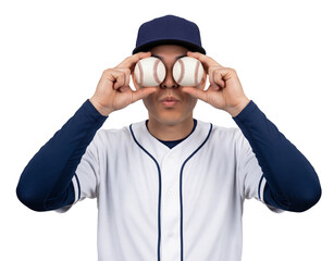 Asian baseball player holding two balls over his eyes and smiling and feeling playful