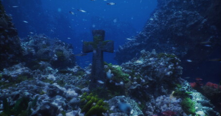 Underwater stone cross on seabed coral, bathed in deep blue light, surrounded by colorful coral, swaying algae, small reef fish, scattered shells and sediment, © icetray