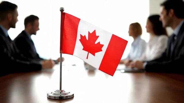 Canadian Desk Flag on Meeting Table During Business Discussion