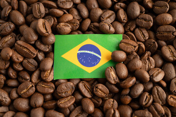 Brazil flag on coffee beans, shopping online for export or import food product.