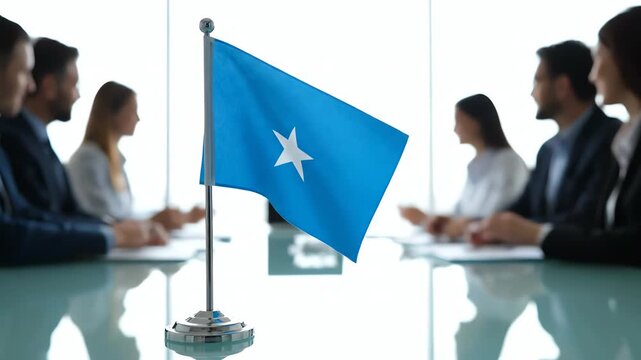 Small Somali Flag on a Table During a Business Meeting with People in Background