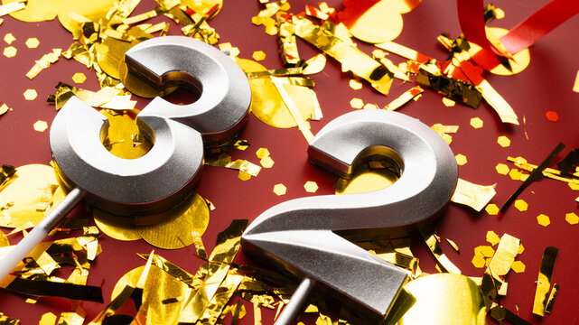 Number 32 celebration birthday digit on Red festive with confetti background. thirty-two year birthday. concept of birthday, anniversary and date.