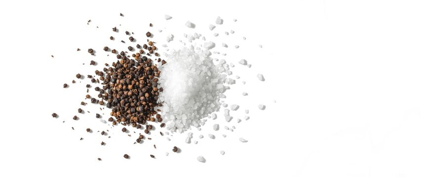 Dried whole black pepper seed with white coarse sea salt on a white background, top view