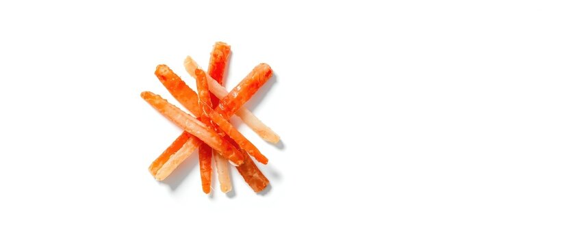 Yummy crab sticks on a white background