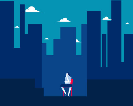 Investment. A woman is sitting in a contemplative position in an urban environment.