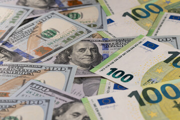 Obraz premium Mix Of US Dollars And Euro Banknotes Background