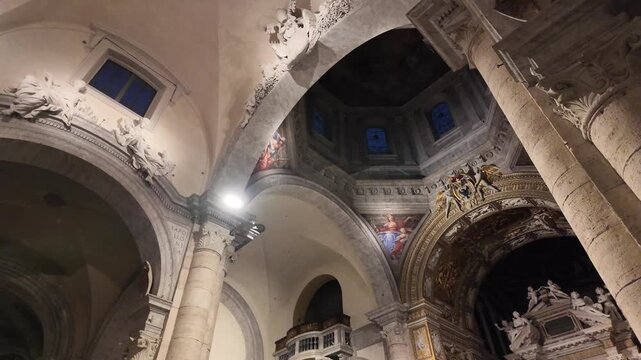 Slow motion cinematic interior of Santa Maria del Popolo ceiling, Rome.