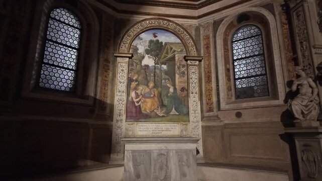 Slow motion cinematic shot of a side chapel in Santa Maria del Popolo, Rome