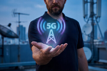 Fototapeta premium Network engineer holding holographic 5G antenna above palm on rooftop