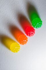 Sour Gummy Candies with Shadow and Glow of Color