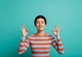 Woman meditating and holding hands in mudra position with eyes closed.