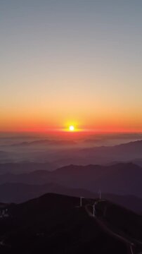 Vertical Mountain Sunrise Timelapse with Golden Sun and Morning Sky
