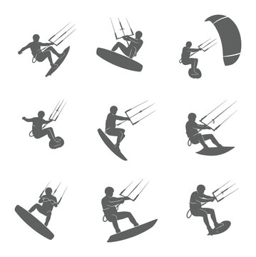 A dynamic collection of kitesurfing figures in action various stances and movements isolated vector silhouette action poses
