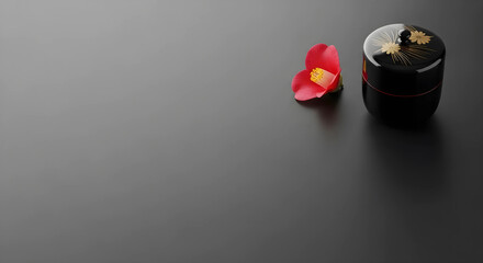 茶道具の棗と花びらのシックな和風背景。消炭色の背景に右上の格式高い装飾。高級旅館やブランド向けのデザイン余白。