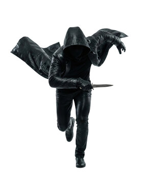 Hooded assassin running with knife isolated. Action movie concept.