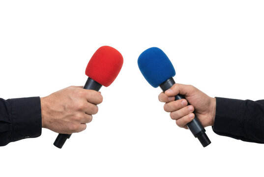 Hands holding red and blue microphones isolated. News interview.