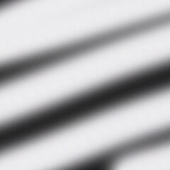 Abstract blurry black and white curved shapes in a dynamic composition viewed from above in monochrome