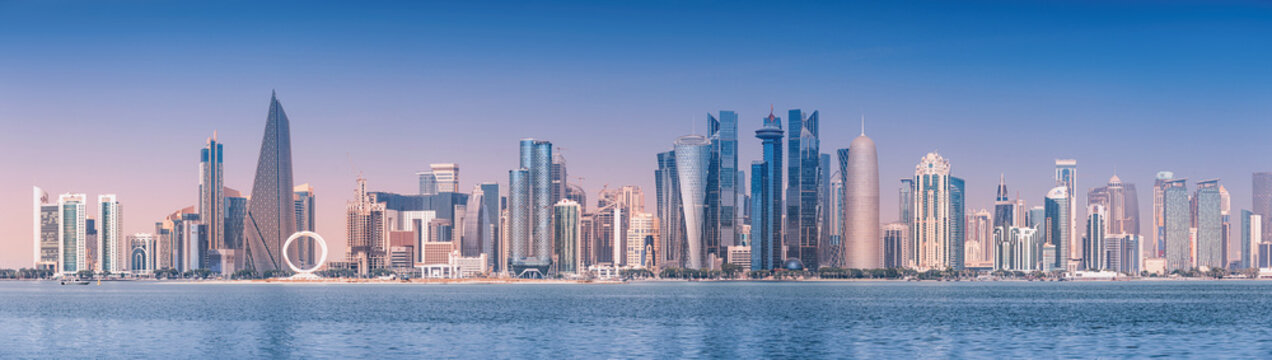 1 December 2025, Doha, Qatar: business district cityscape showing modern skyscrapers and architecture along the coast, reflecting economic growth