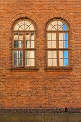 Two Arch Windows Mirror Glass at Brick Building in Oslo Norway