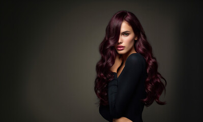 Fototapeta premium elegant woman with dark pink wavy wolfcut hairstyle, high fashion editorial portrait of stylish woman with glossy wolfcut, modern beauty portrait showcasing front and back wolfcut hairstyle