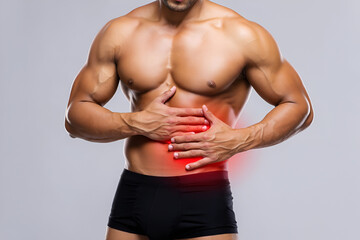 Muscular man holding abdomen with red pain indicator discomfort