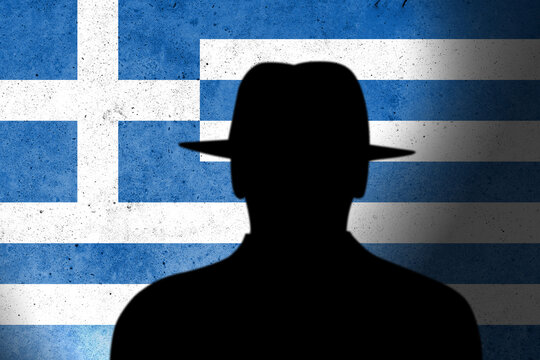 Greece spy and hackers launch cyber attacks. Hackers violate privacy. Hacker is searching  personal data. Social media data breaches