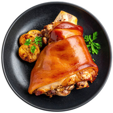 Hearty german eisbein pork knuckle, golden-brown and tender, presented with traditional sides, isolated on white background